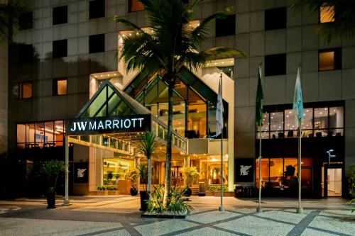 a building with a palm tree in front of it at JW Marriott Rio de Janeiro in Rio de Janeiro