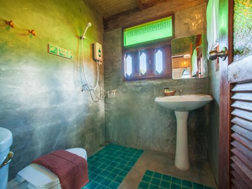 Koupelna v ubytování Baan Chokdee Pai Resort