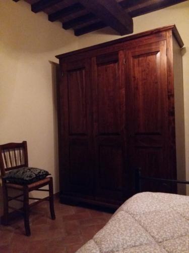 Ένα ή περισσότερα κρεβάτια σε δωμάτιο στο Agriturismo Il Melo