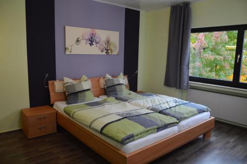 Postel nebo postele na pokoji v ubytování Eifelhaus4you