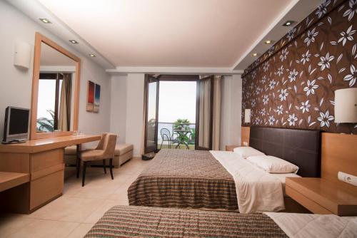 Postel nebo postele na pokoji v ubytování Mistral Hotel