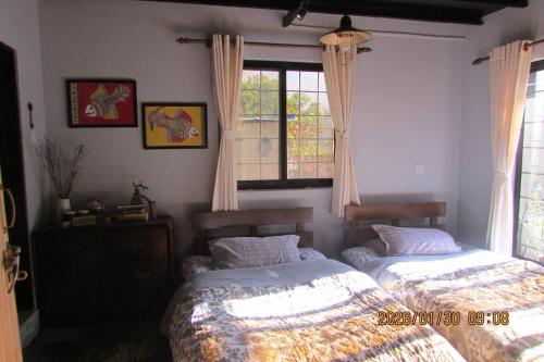 Llit o llits en una habitació de Big J's Farmhouse