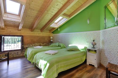 Ένα ή περισσότερα κρεβάτια σε δωμάτιο στο Eguzki B&B