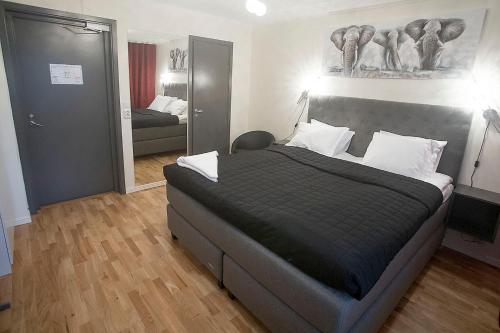Krevet ili kreveti u jedinici u okviru objekta Kungsbacken Hotell & Konferens