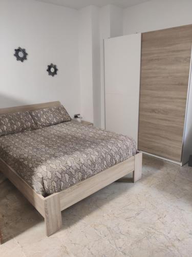 a bedroom with a bed in a room at playa Almería zapillo loft in Almería