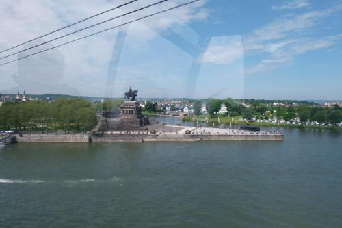 a statue in the middle of a body of water at Pension Garni Haus Bismarckhöhe in Bad Ems
