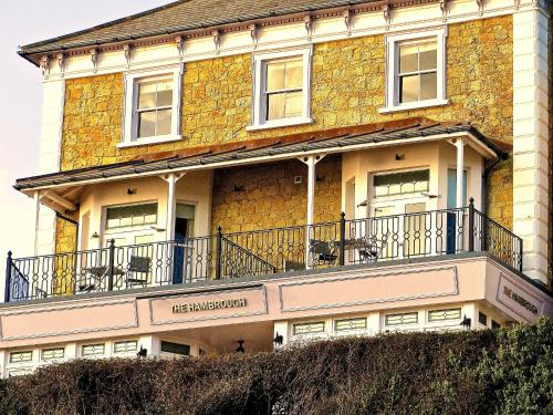 a building with a balcony on top of it at The Hambrough in Ventnor