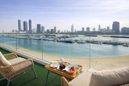 Luxury Beachfront Marina View Apartment With Private Beach Access By Green Sky Holiday Homes