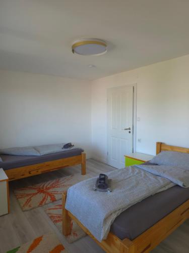 Llit o llits en una habitació de Apartments Amy