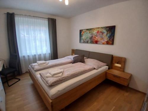 a bedroom with a bed in a room at Ferienwohnung Josef in Steyr