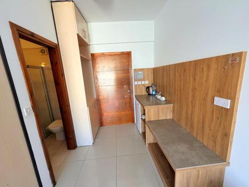a small bathroom with a sink and a toilet at The Horse Farm Hotel in Kyrenia