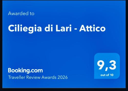 a screenshot of a cell phone with a blue screen at Ciliegia di Lari - Attico in Lari