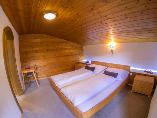 Postel nebo postele na pokoji v ubytování Alpenresorts