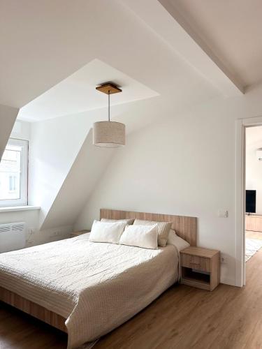 Foto New 59 sqm Central Luxury Apartment with free parking 2
