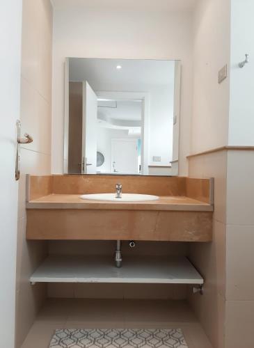 a bathroom with a sink and a mirror at Unique cozy villa sea view in Hurghada