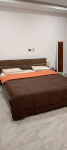 Llit o llits en una habitació de Favour