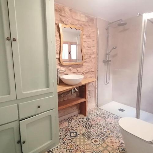 a bathroom with a sink and a shower at Escapada rural en Nulles, cerca de Tarragona in Nulles