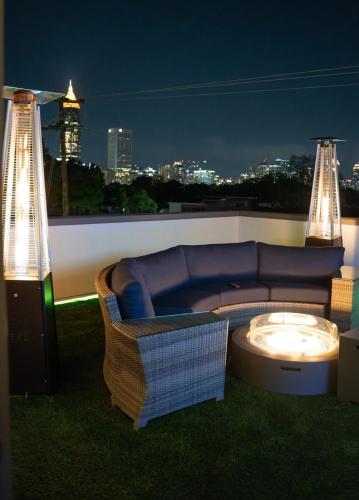 a couch sitting on top of a roof at Stairway To Heaven in Atlanta