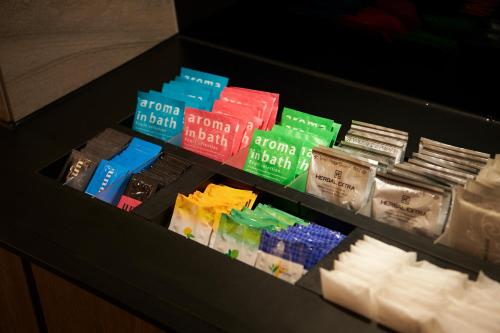 a drawer filled with different types of food at Sotetsu Fresa Inn Ginza-Nanachome in Tokyo