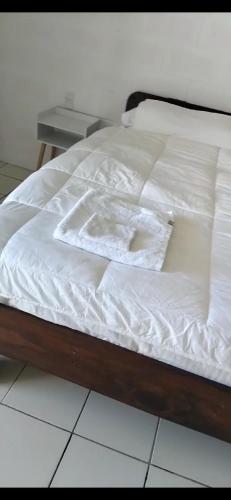 En eller flere senge i et værelse på Uncle Ben's