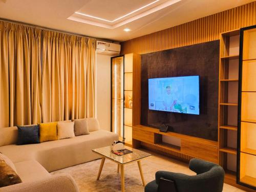 TV in/ali zabaviščno središče v nastanitvi Emirates Residence