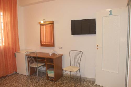 Camera Quadrupla con Bagno Privato Esterno