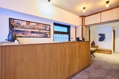 a lobby with a bar in a building at Hotel Vintage Tokyo Kagurazaka in Tokyo