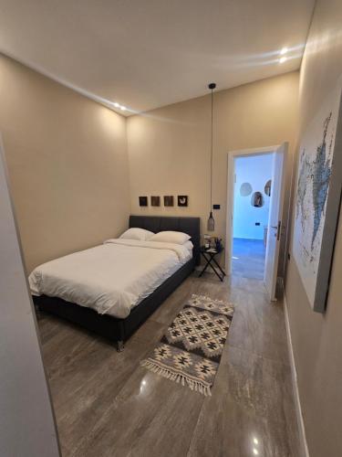 a bedroom with a large bed and a rug at Luxury Queen Mountian in Eilat