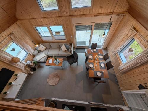 an overhead view of a living room in a tree house at KREIDESEE 47 - Hemmoor in Hemmoor