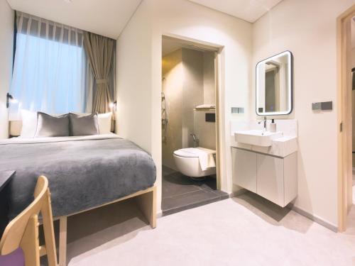 Koupelna v ubytování Coliwoo Midtown - CoLiving