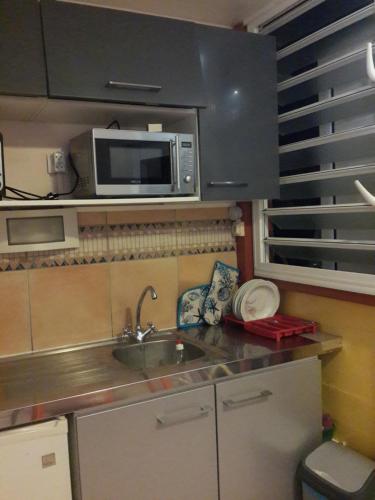 Η κουζίνα ή μικρή κουζίνα στο Appartements Residence Mahoghany