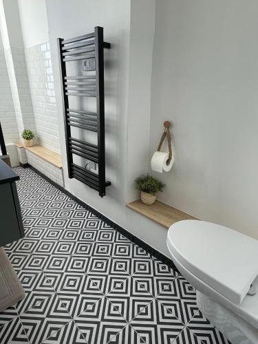 Et badeværelse på L'Appartement Vert