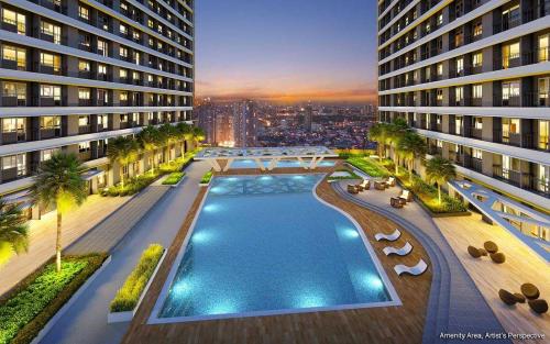 an aerial view of a building with a swimming pool at AHN Haven in Sampong