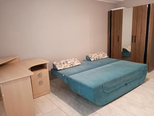 Llit o llits en una habitació de Telecentru apartament