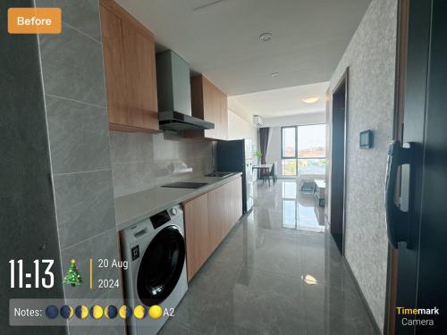 Cuina o zona de cuina de RDC Hotel