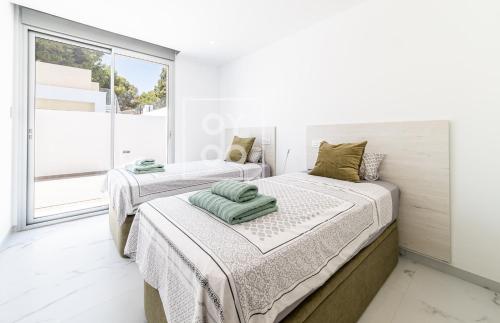 Villa Coral, chic coastal design, saltwater pool - by OYOOSTAYS