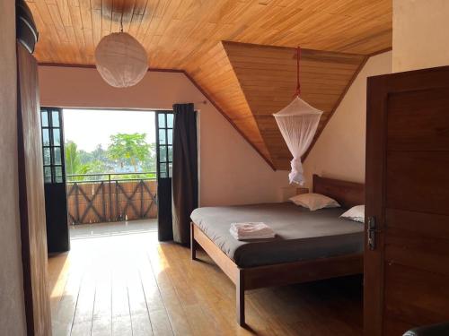 Llit o llits en una habitació de Villa tropical