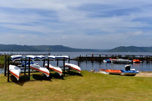 a group of boats in the water next to a dock at Baywater Village by MyResorts in Sedgefield