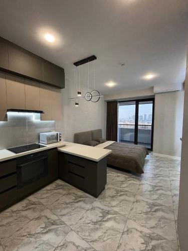 Кухня или мини-кухня в U-tower studio city view
