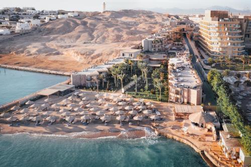 an aerial view of a beach with umbrellas at ananea Hurghada - Adults Only in Hurghada
