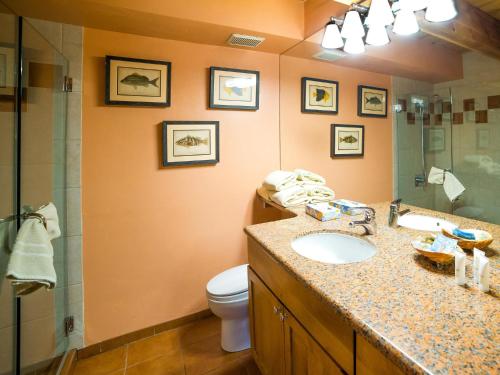 a bathroom with a sink and a toilet and a shower at Lift One Condominiums - 1, 2, 3 Bedroom Units Adjacent To Downtown Aspen in Aspen