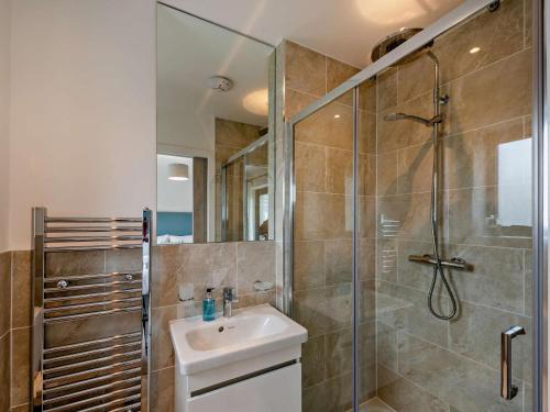 a bathroom with a shower and a sink and a toilet at 2 Bed in Bideford oc-91748 in Northam
