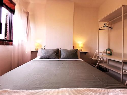 a bedroom with a large bed in a room at Apartment Terrarossa 2 in Fažana