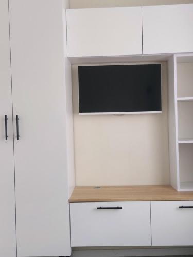 Kuchyň nebo kuchyňský kout v ubytování Studio Room
