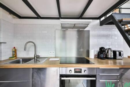 WeHost - Loft design au cœur du Marais – 4 voyageurs