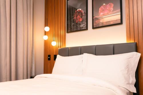 Cama ou camas em um quarto em Ruby Hotels