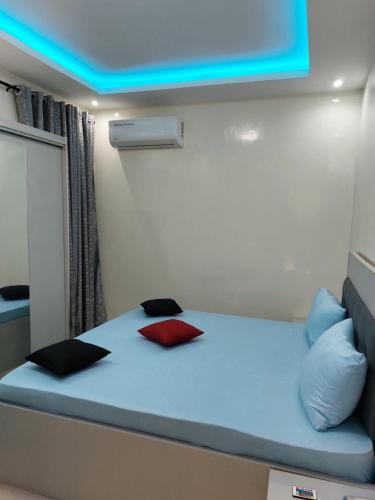 Llit o llits en una habitació de Biagui Sky Studio