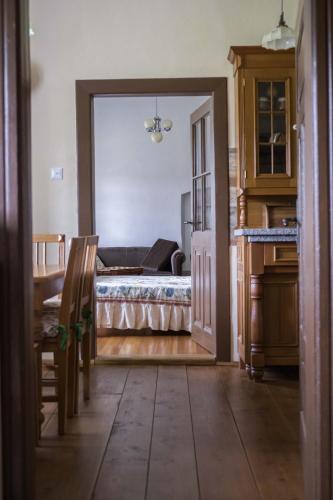 a view of a bedroom with a bed in a room at Zámek Nemilkov in Velhartice