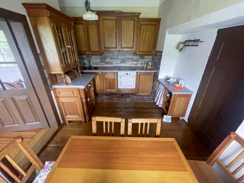 an overhead view of a kitchen with wooden cabinets at Zámek Nemilkov in Velhartice