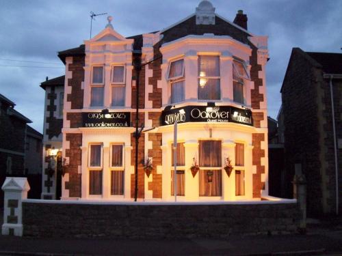 a large building with a lit up facade at Oakover Guest House in Weston-super-Mare
